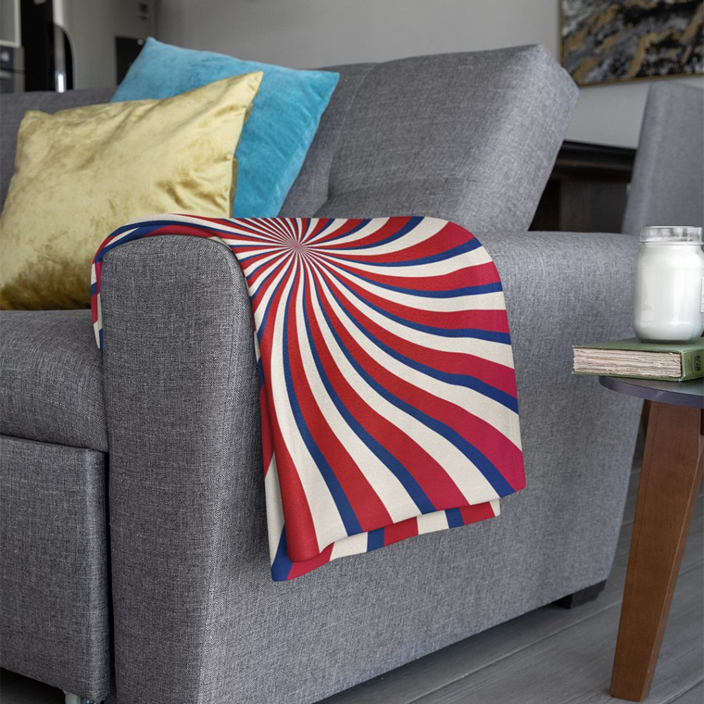 sublimated-throw-blanket-mockup-placed-over-a-couch-arm-rest